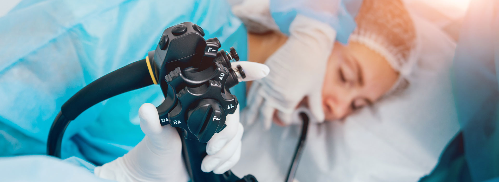 Doctor holding endoscope before gastroscopy
