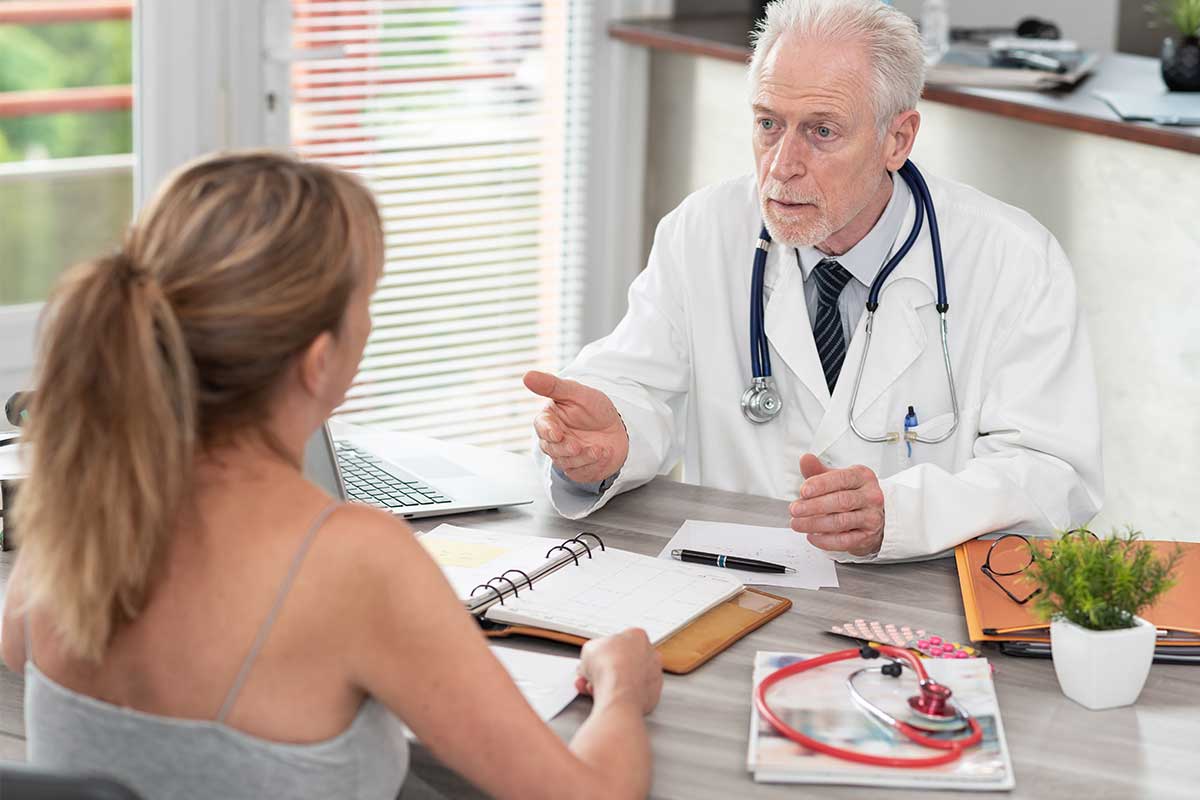 Patient talking with her doctor